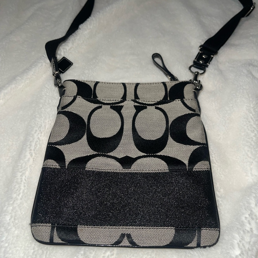 Coach Signature Gray and Black Monogrammed Crossbody Bag with Multiple Pockets.